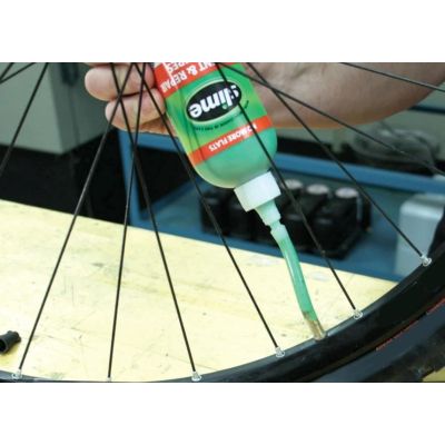 Sellador y preventivo de pinchazos Slime para neumáticos de cámara, 237ml